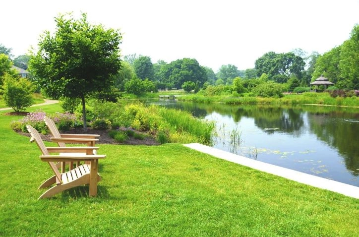 GOLDENTEAK Teak Adirondacks at Cantigny Resort Illinois Site Furnishings